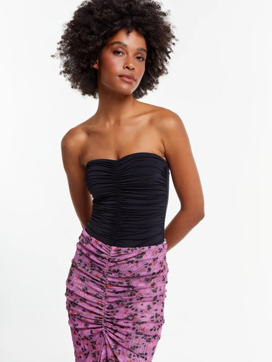 Calça ou saia de grife em promoção