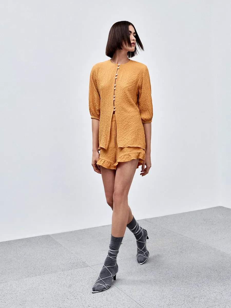 Blusa de grife em promoção